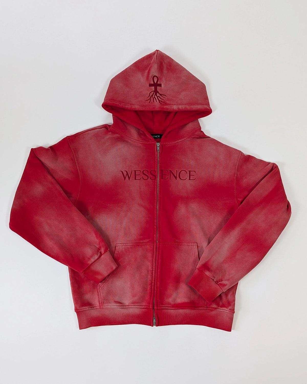 Front view WESSENCE HELL TEMPTATION red washed hoodie with chest logo and red demon hood logo.